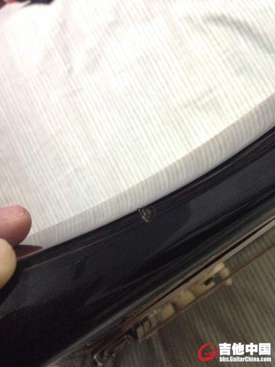 说这有个小磕碰，米粒大小