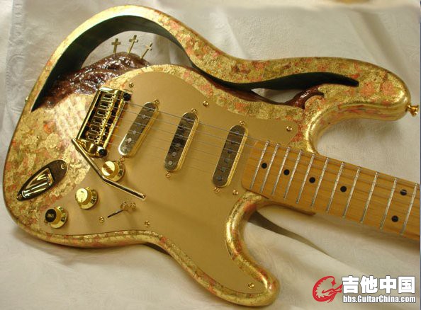 custom-carved-christian-motif-stratocaster-guitar.jpg